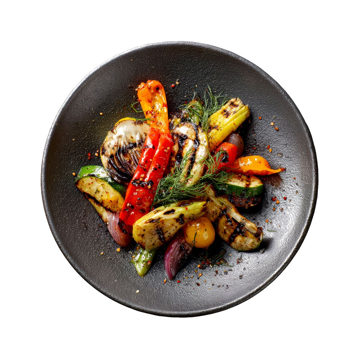 Charred ratatouille of grilled peppers, fennel, zucchini and cherry tomatoes on a matte black plate